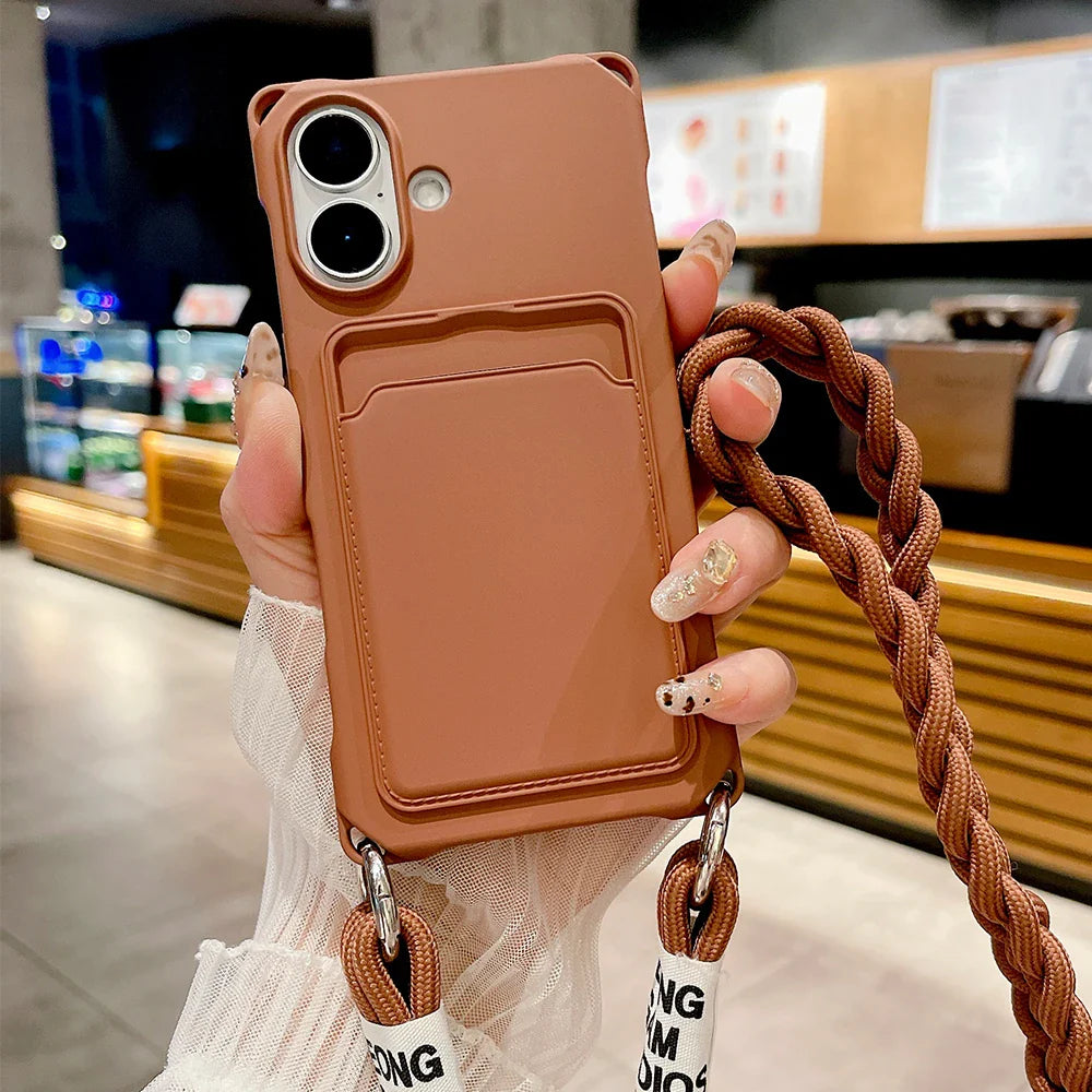 Brown phone case with card holder and braided strap.