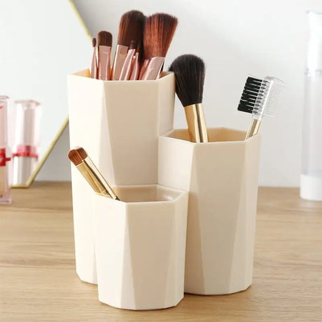 a set of makeup brushes and brushes in a cup