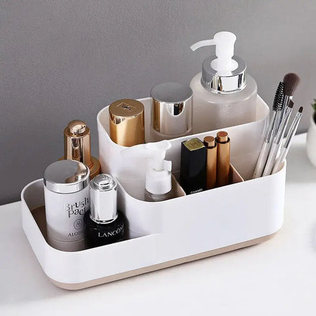 a white desk organizer with makeup brushes and cosmetics
