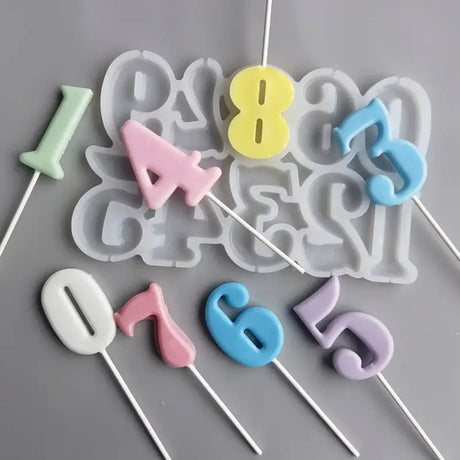 a bunch of colorful plastic letters on a stick
