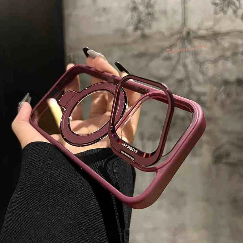 Burgundy phone case with ring stand.