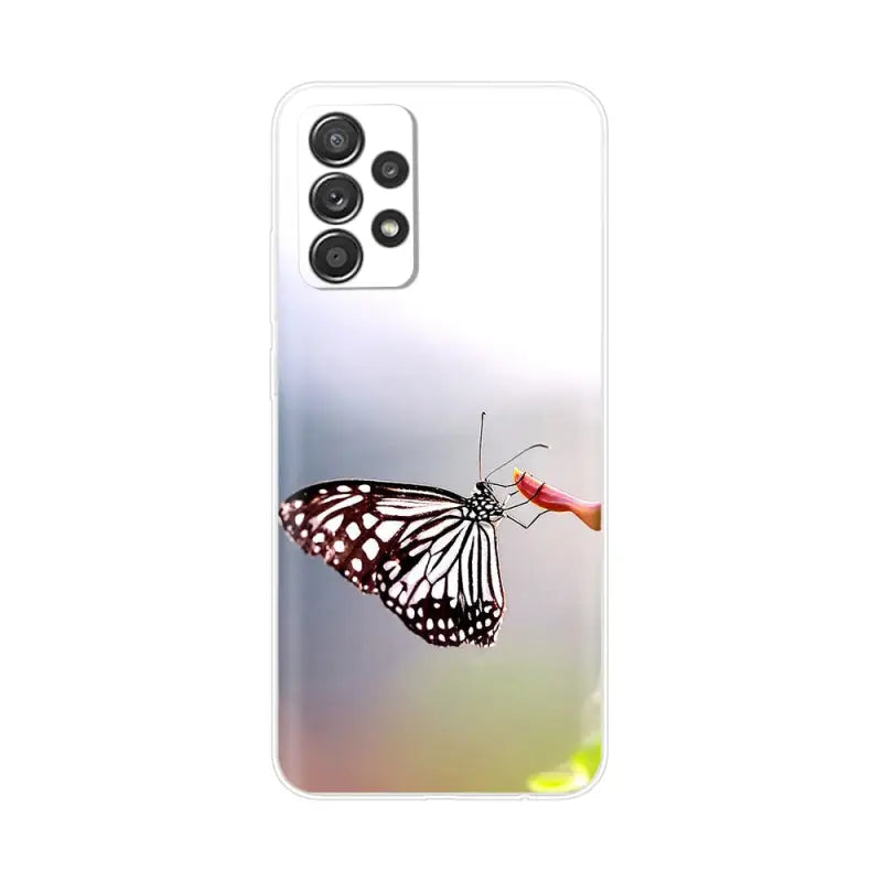 a butterfly on a flower phone case