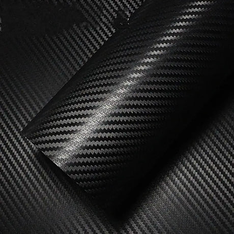 a close up of a black carbon fiber material