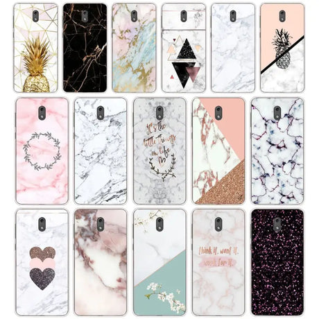 a set of twelve cases with marble and glitter designs