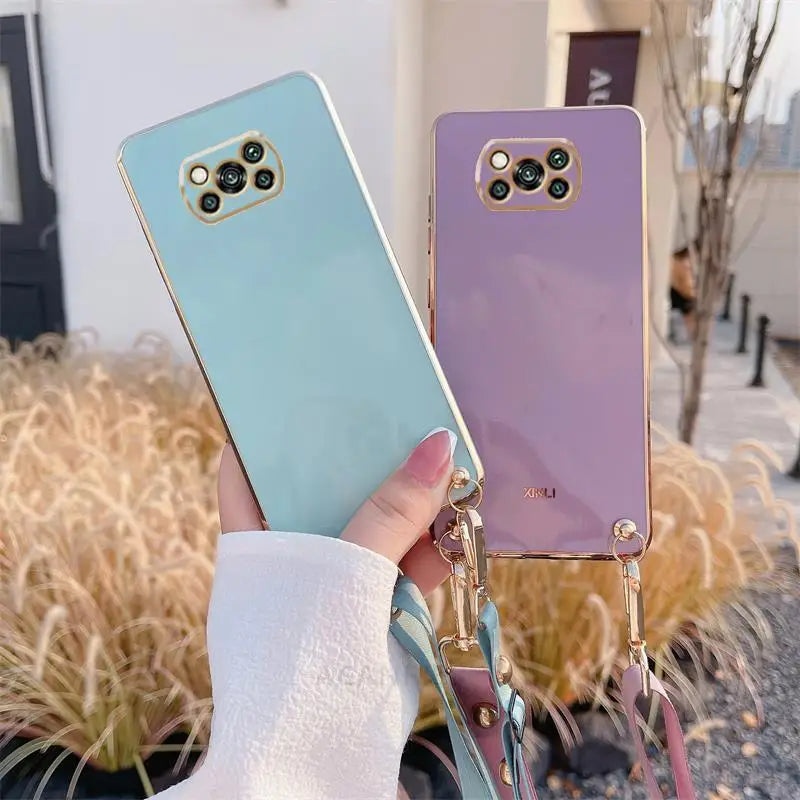 a woman holding a phone case with a phone holder