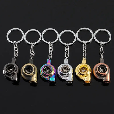 a set of five key chains with a metal ring