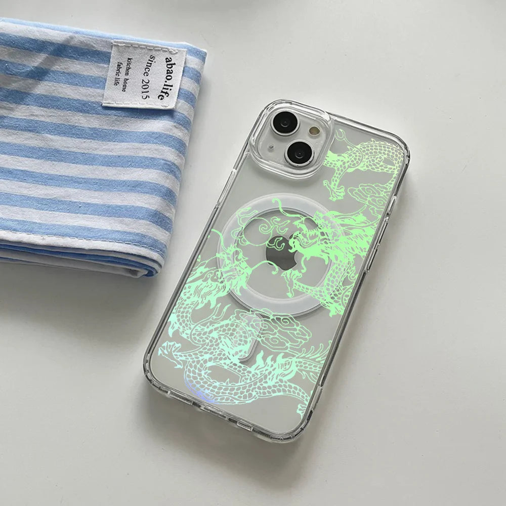 Clear iPhone case with a glowing green dragon design and a MagSafe ring.