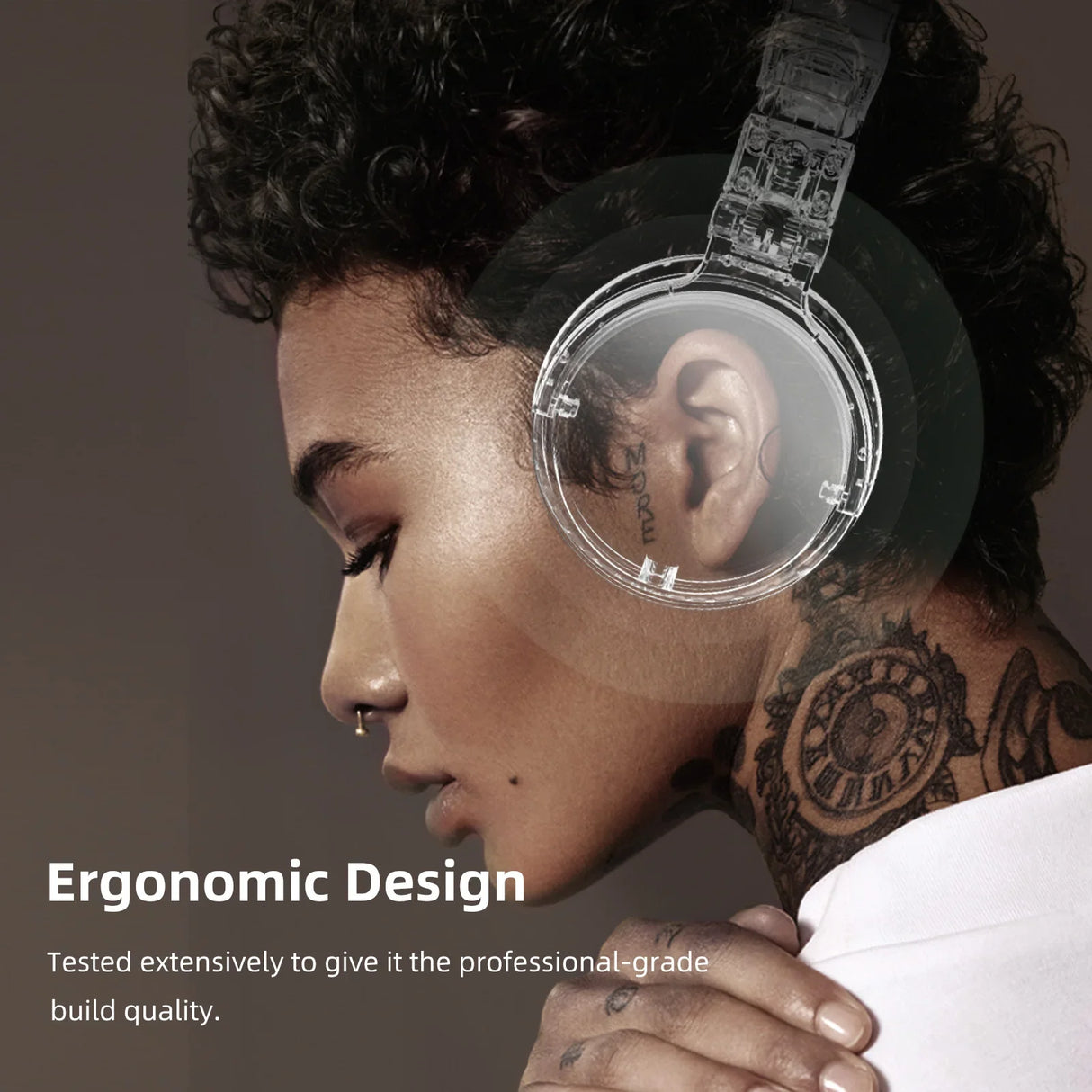 Clear, over-ear headphones with a transparent earcup showcasing the internal components.
