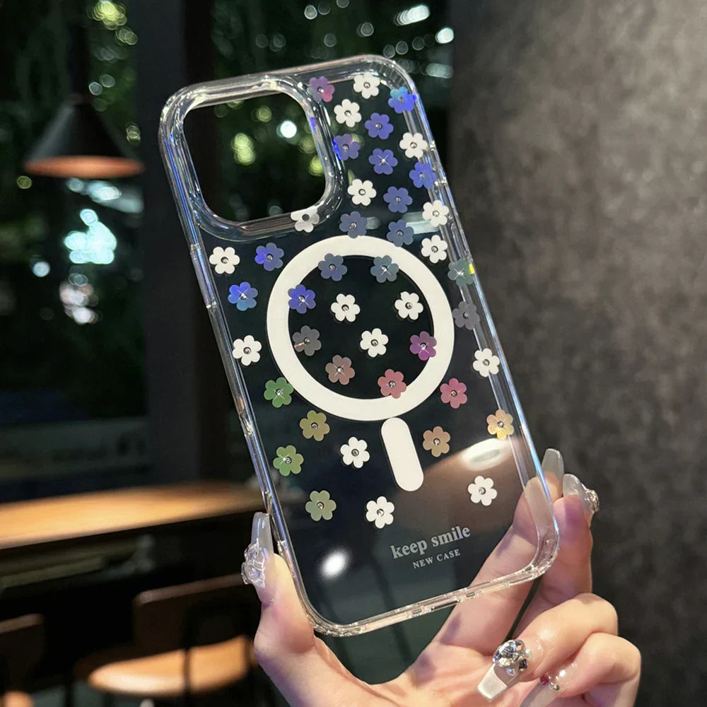 Clear phone case with floral design and MagSafe compatibility.