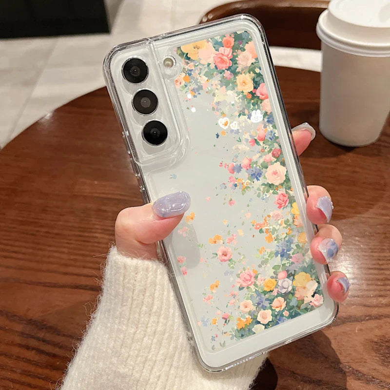 Clear transparent phone case with delicate pink peach and blue floral design on back for samsung galaxy