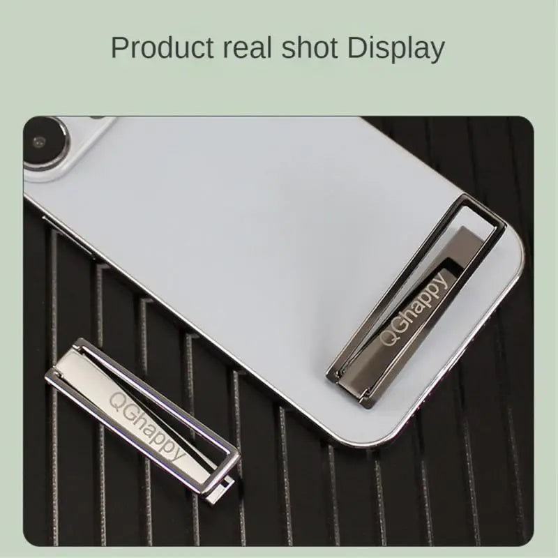 there is a pen and a clipboard on a table