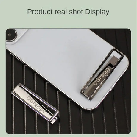 there is a pen and a clipboard on a table