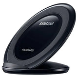 a close up of a black samsung wireless charger on a white surface