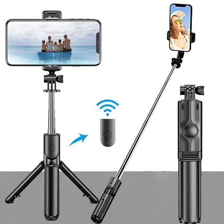 a close up of a cell phone with a selfie stick attached to it