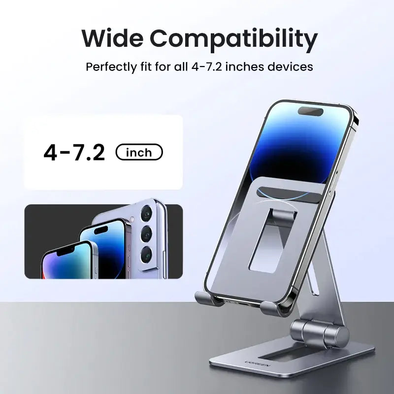 A close up of a cell phone on a stand with a phone in the background