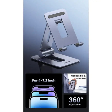A close up of a cell phone on a stand with a camera