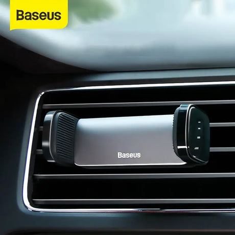 the dashboard of a car with the base button on