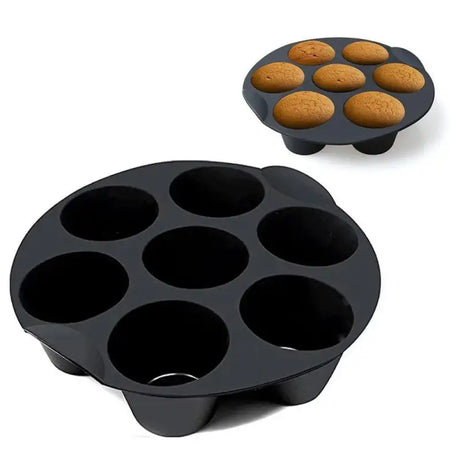 a close up of a muffin pan with a muffin pan in the background