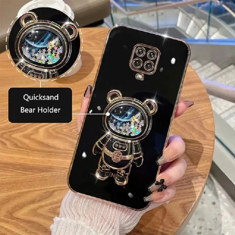 a person holding a phone with a watch on it
