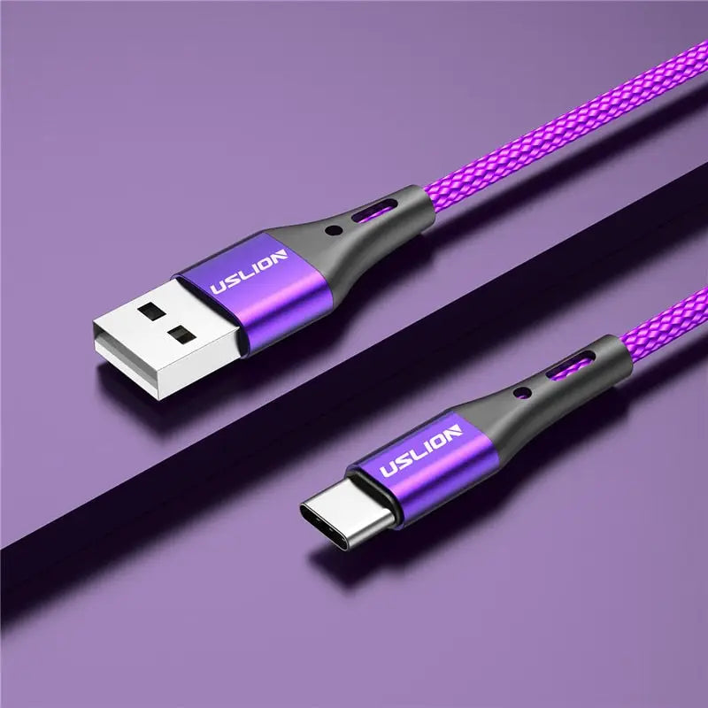 a close up of a purple and black cable connected to a phone