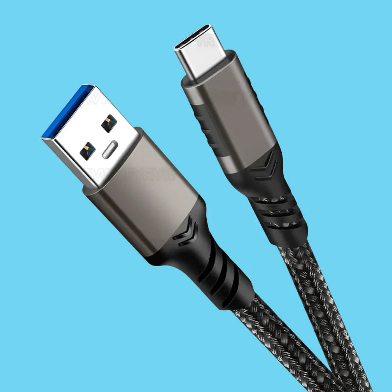 A close up of a usb cable with a clock on it
