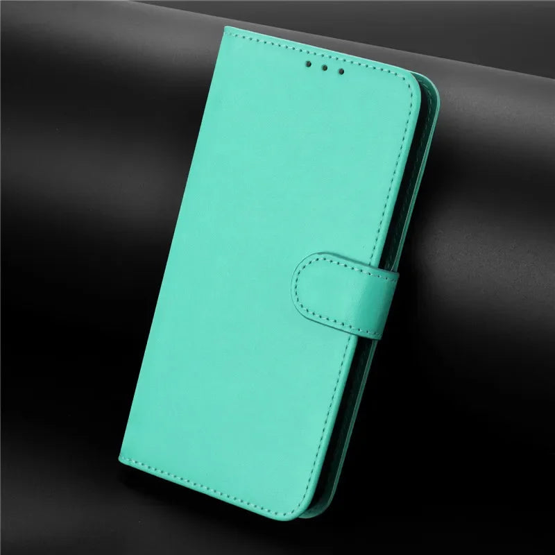 Closed teal smartphone wallet case with a magnetic clasp.