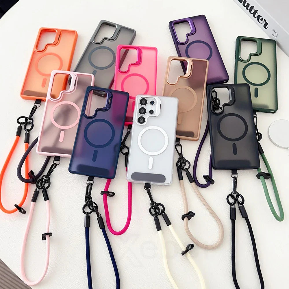 A collection of colorful translucent phone cases with magnetic charging rings and attached lanyards.