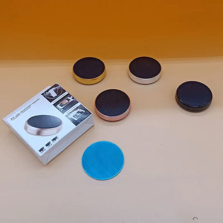 a box with a blue button and a black button