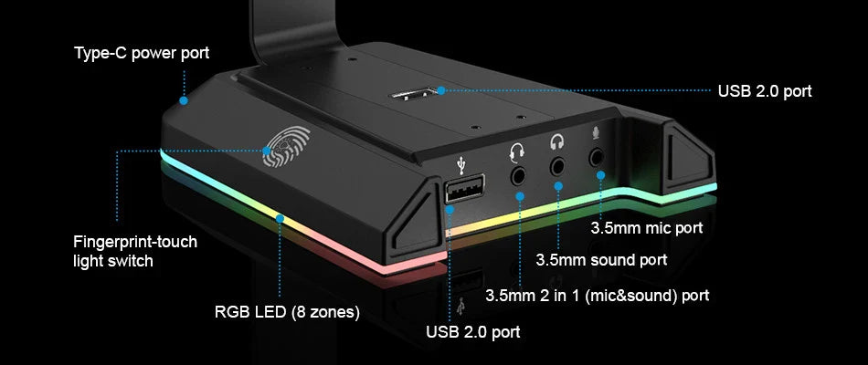 Gaming console or external device hub with multiple ports and RGB lighting.