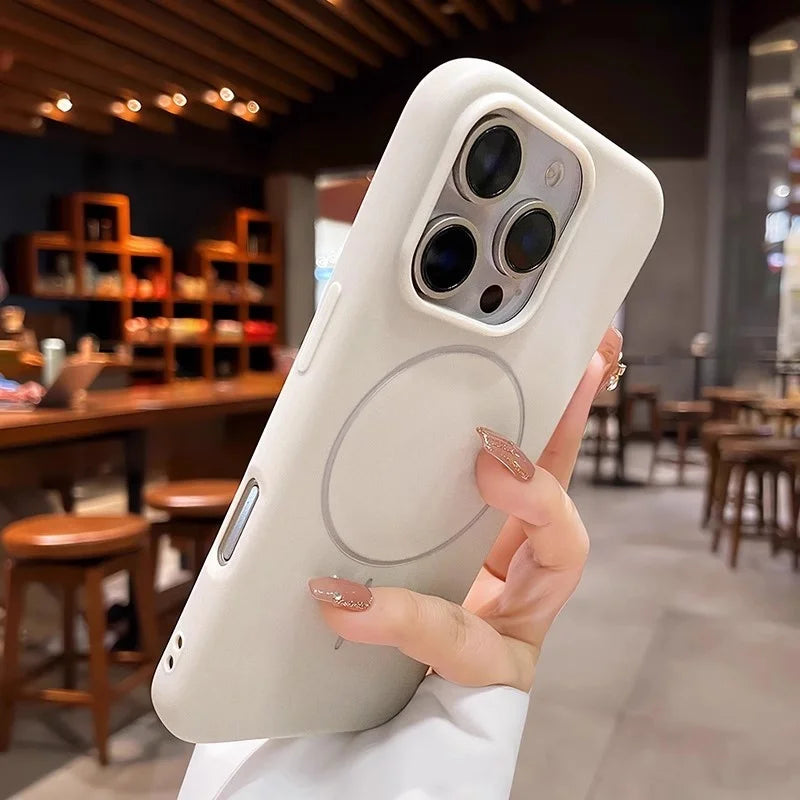 Cream-colored iPhone case with a circular magnetic ring and triple camera cutouts.
