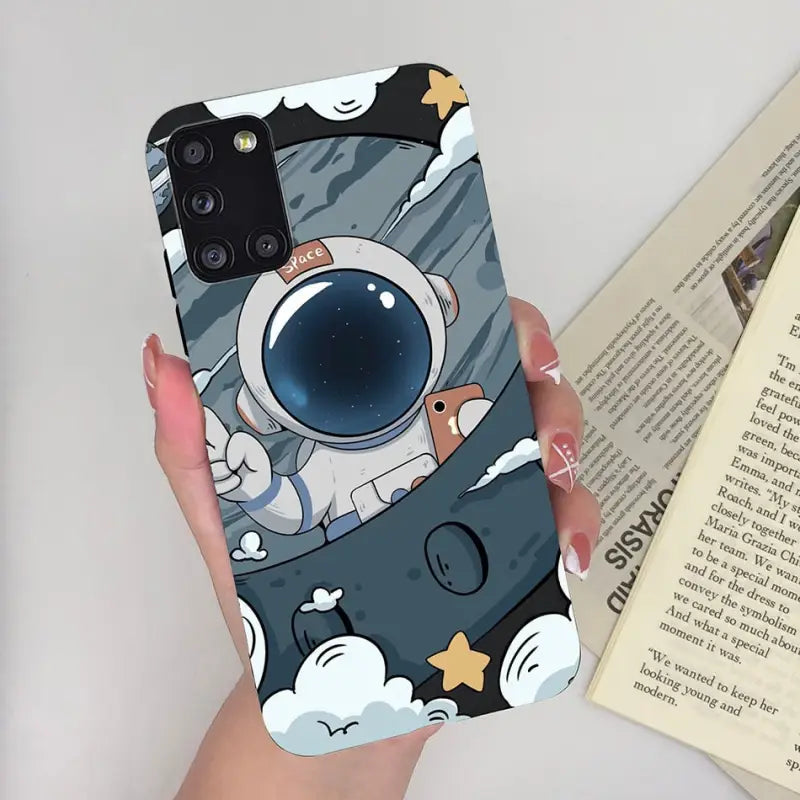 a person holding a phone case with a cartoon character on it
