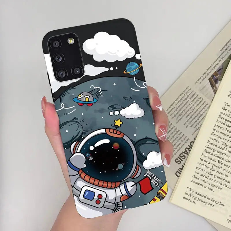 a person holding a phone case with a cartoon character on it