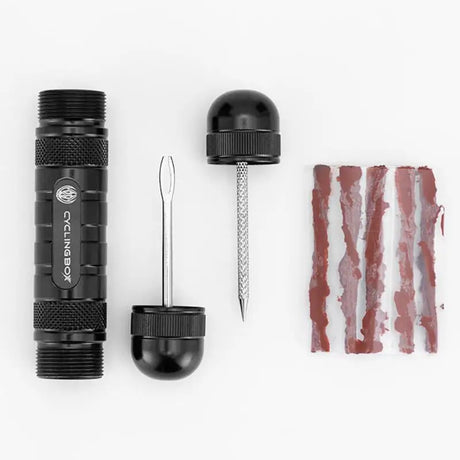 the black and white tool is next to a piece of bacon