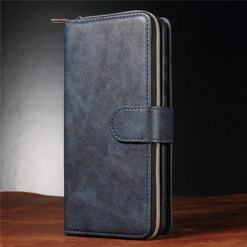 Dark blue leather wallet with a zipper and snap closure.