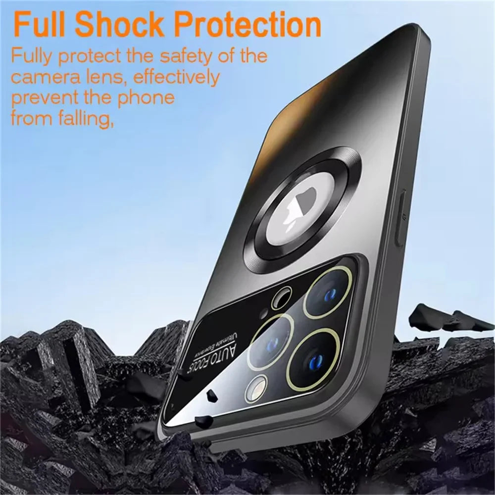 A dark gray phone case with a transparent back, a raised camera module protector, and a circular magnetic charging ring.