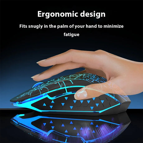 Ergonomically designed computer mouse with blue LED lighting and a geometric pattern.