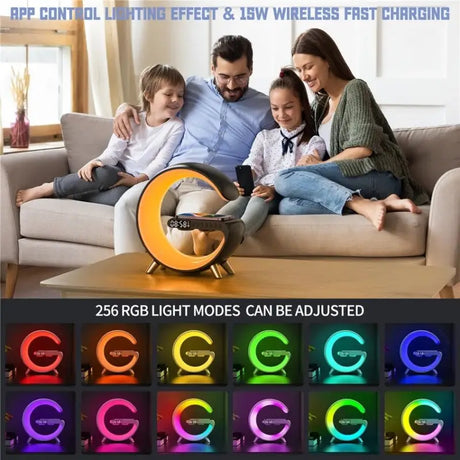 a family sitting on a couch with a remote control light