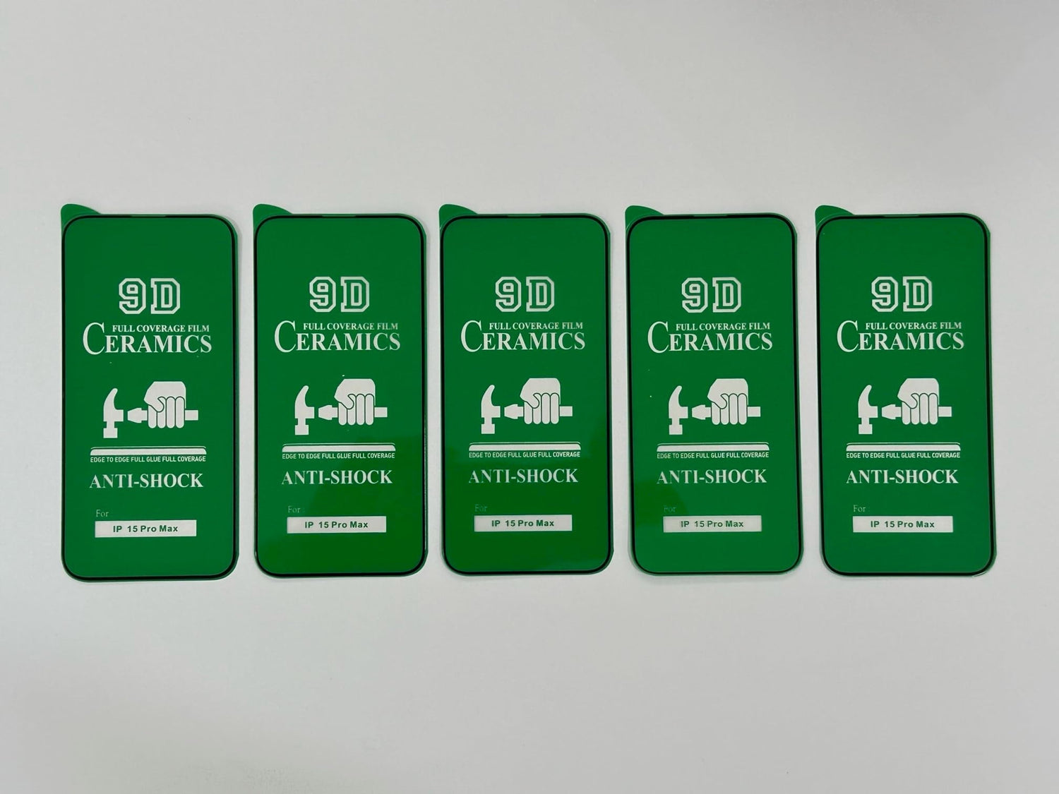 Five green-framed iPhone screen protectors.