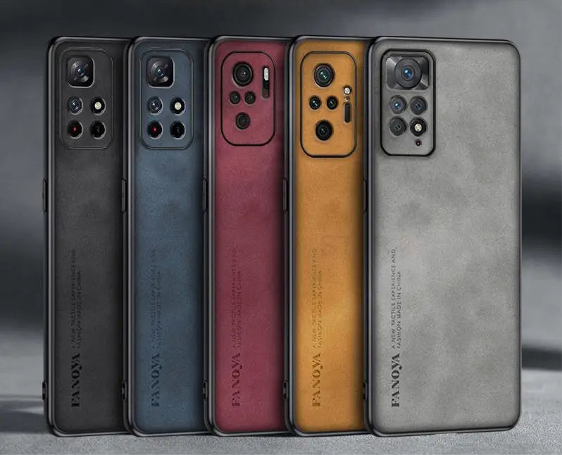 Five smartphones in different colors lined up side by side, showcasing their rear camera arrays.