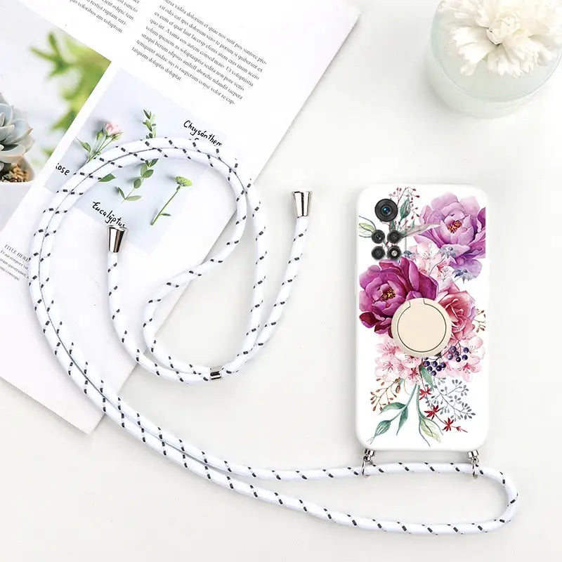 a white phone case with a floral design