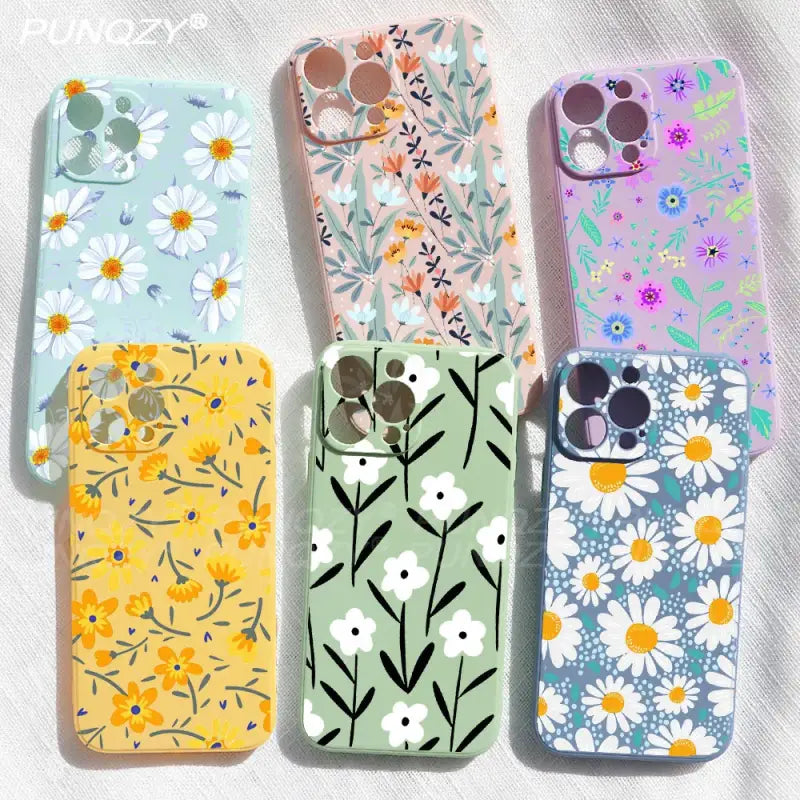 Four cases with flowers and birds on them