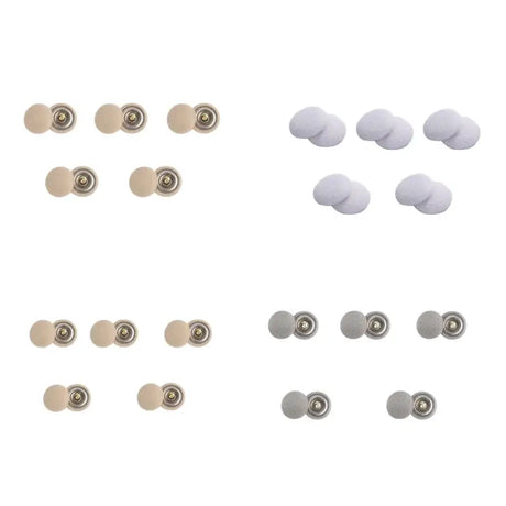 a set of white and silver metal buttons