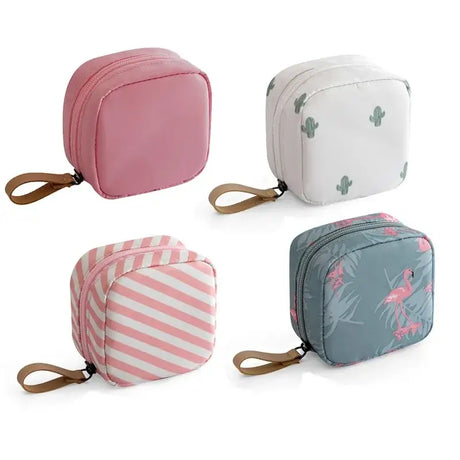 four small cosmetic bags with pink and white stripes