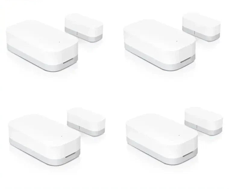 Four different views of a door window sensor