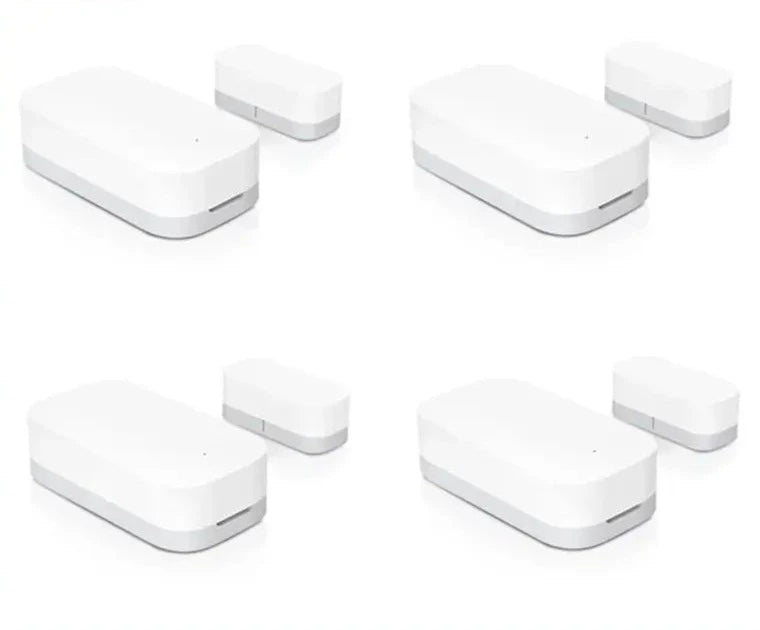 Four different views of a door window sensor