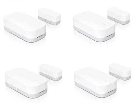 Four different views of a door window sensor