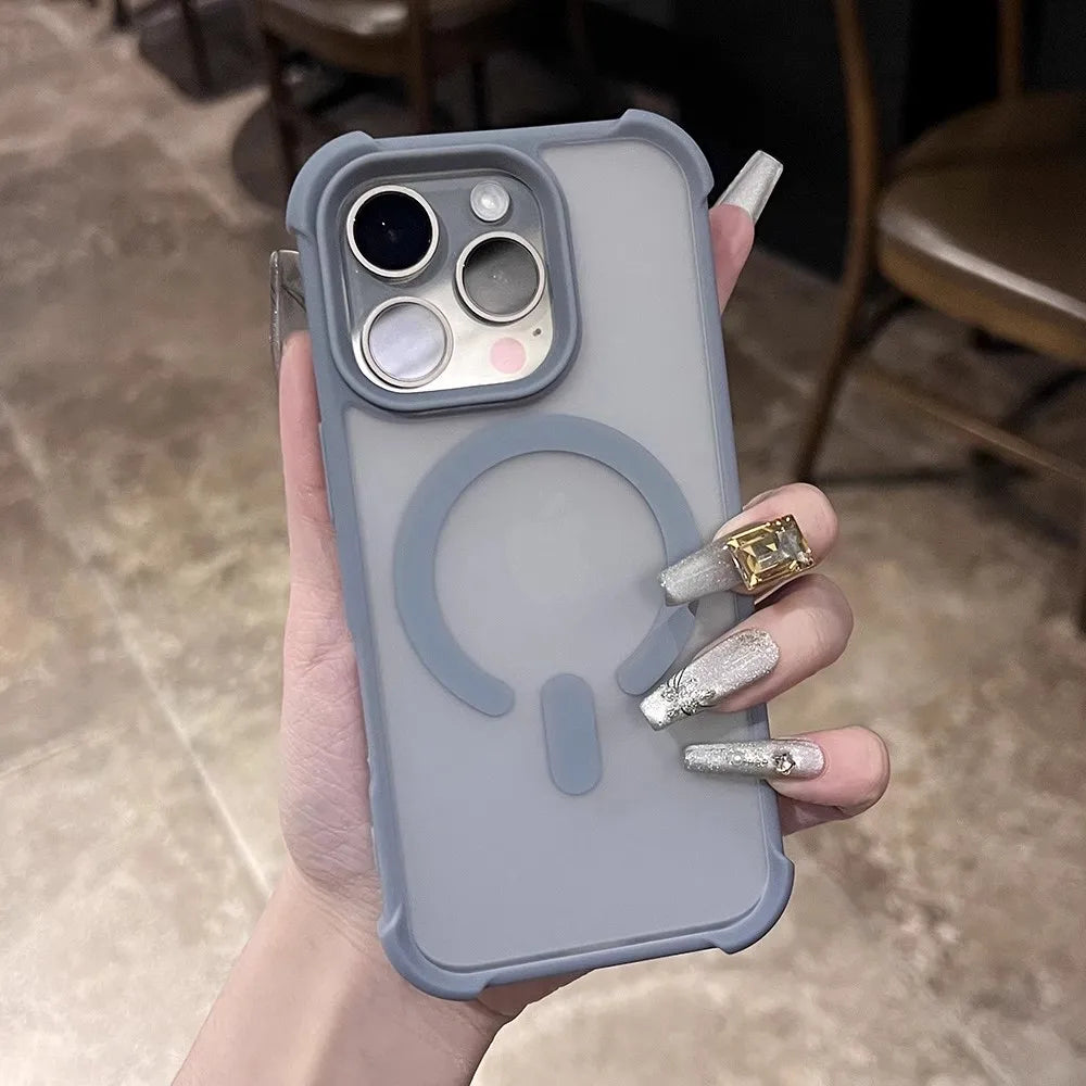 Frosted gray iPhone case with a MagSafe ring and raised camera lens protection.