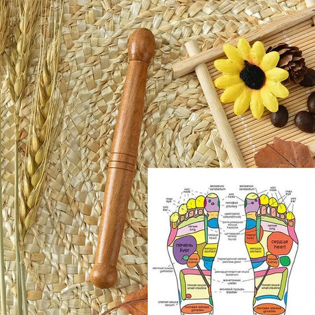 a close up of a picture of a person’s foot with a stick and a flower