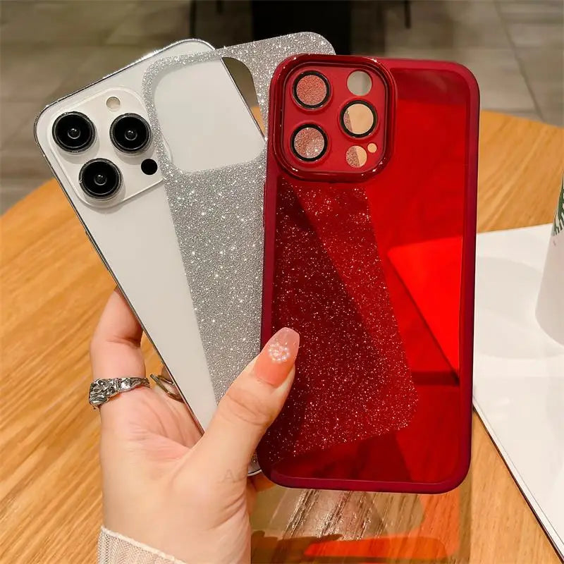 a woman holding a red iphone case