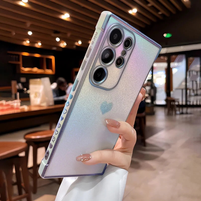 Glittery holographic phone case with a heart design.